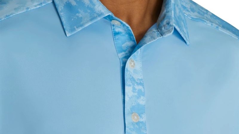 Áo cộc tay FootJoy 82205 màu xanh da trời là sự lựa chọn hoàn hảo của golfer khi ra sân thi đấu